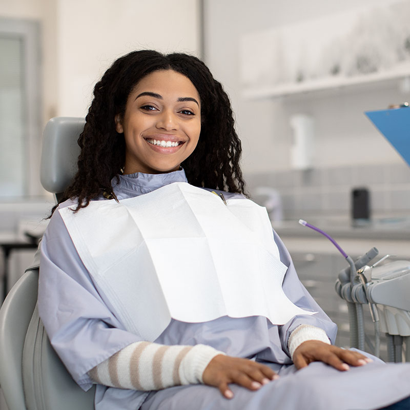 Woman sitting in chair during appointment
